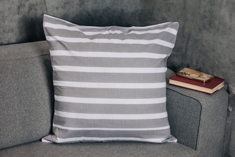 Φωτογραφία από  COTTON CUSHION 45x45 GREY WITH ECRU STRIPES